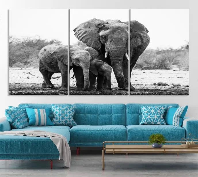 The Elephant Family Africa Wall Art Canvas Print, a black and white triptych of elephants, is presented as museum-quality canvas art.