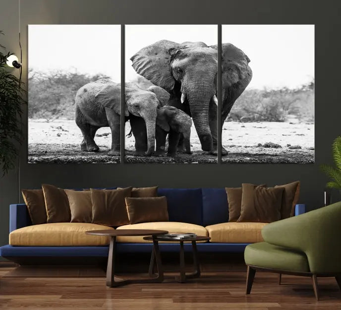 The Elephant Family Africa Wall Art Canvas Print, a black and white triptych of elephants, is presented as museum-quality canvas art.