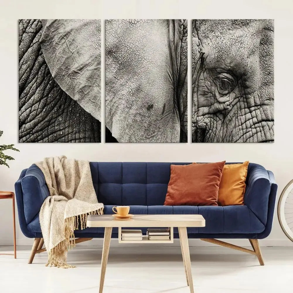 A modern living room features a large Elephant Wall Art Canvas Print in black and white, crafted on museum-quality canvases with UV-protective coating to maintain its elegance.