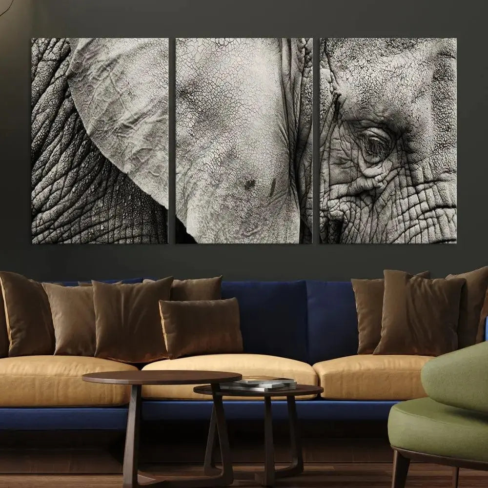 A modern living room features a large Elephant Wall Art Canvas Print in black and white, crafted on museum-quality canvases with UV-protective coating to maintain its elegance.