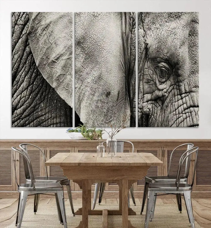 A modern living room features a large Elephant Wall Art Canvas Print in black and white, crafted on museum-quality canvases with UV-protective coating to maintain its elegance.