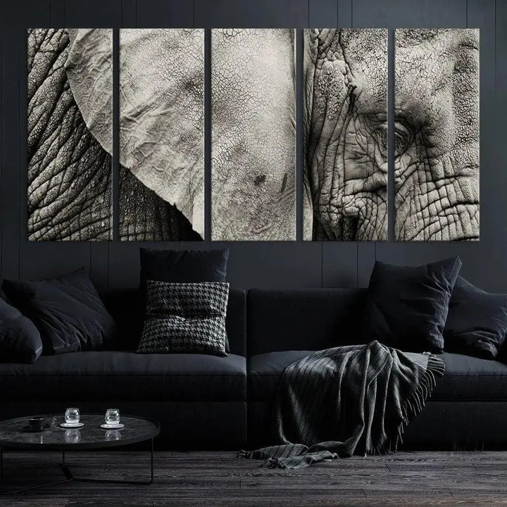 A modern living room features a large Elephant Wall Art Canvas Print in black and white, crafted on museum-quality canvases with UV-protective coating to maintain its elegance.