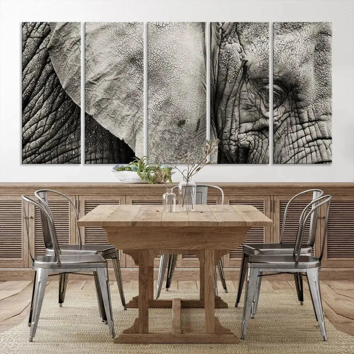 A modern living room features a large Elephant Wall Art Canvas Print in black and white, crafted on museum-quality canvases with UV-protective coating to maintain its elegance.