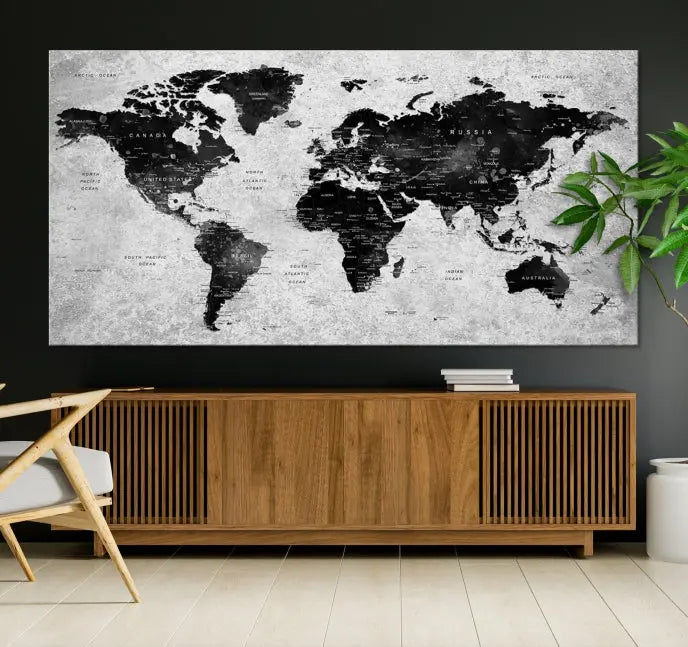 The Eye-Catching Black Push Pin World Map Wall Art Travel Map Canvas Print adorns the wall, bringing gallery-wrapped elegance to your living space.