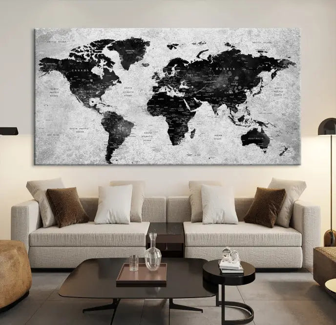 The Eye-Catching Black Push Pin World Map Wall Art Travel Map Canvas Print adorns the wall, bringing gallery-wrapped elegance to your living space.