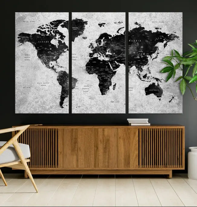 The Eye-Catching Black Push Pin World Map Wall Art Travel Map Canvas Print adorns the wall, bringing gallery-wrapped elegance to your living space.