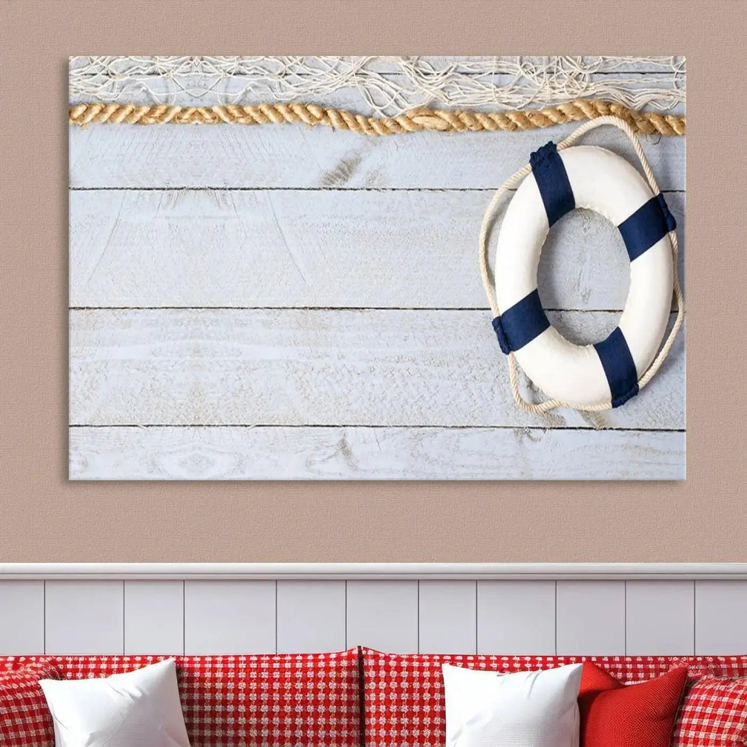 A triptych of the Fancy Lifebuoy and rope on museum-quality canvas with UV-protective coating hangs above.