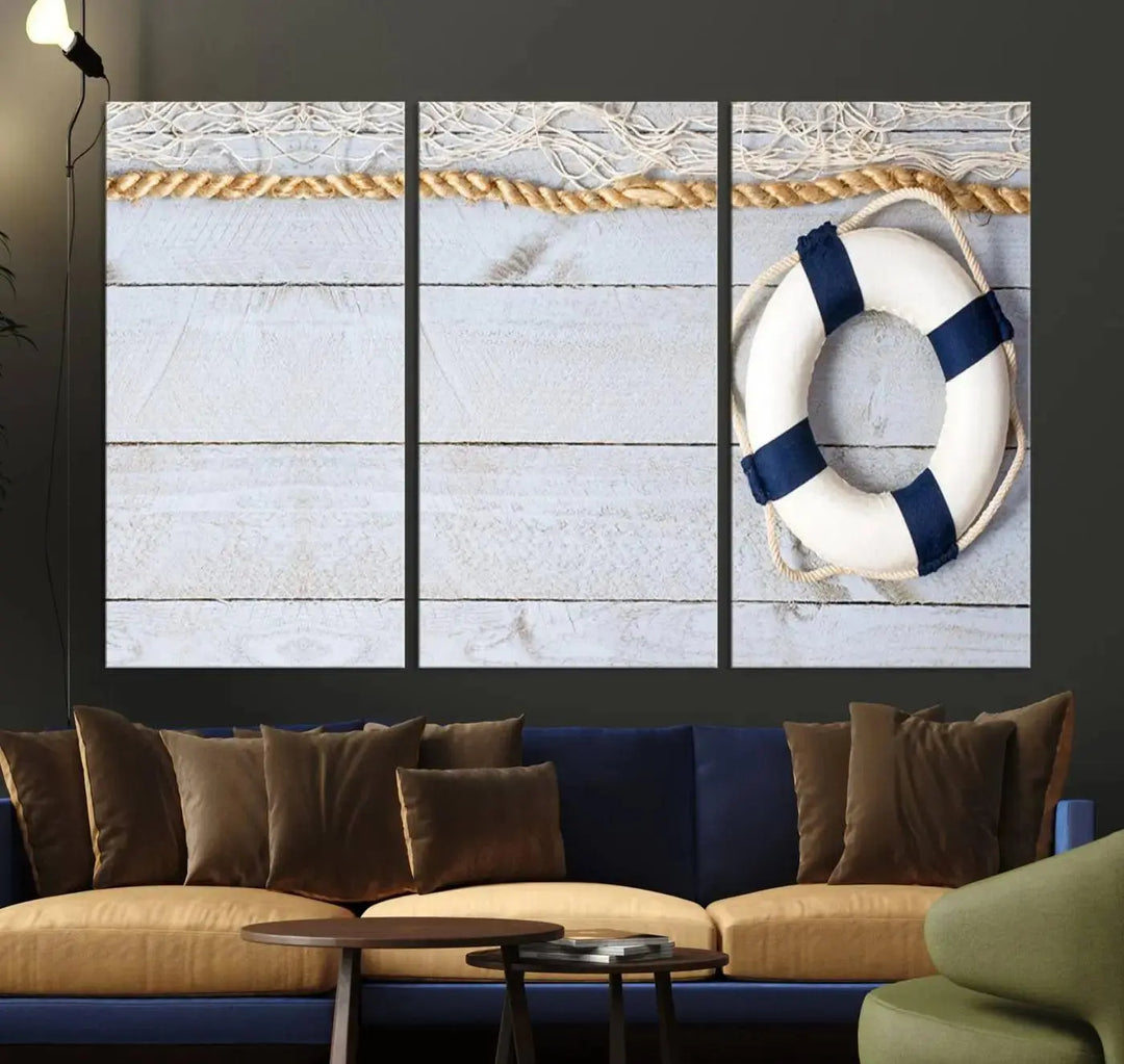 A triptych of the Fancy Lifebuoy and rope on museum-quality canvas with UV-protective coating hangs above.