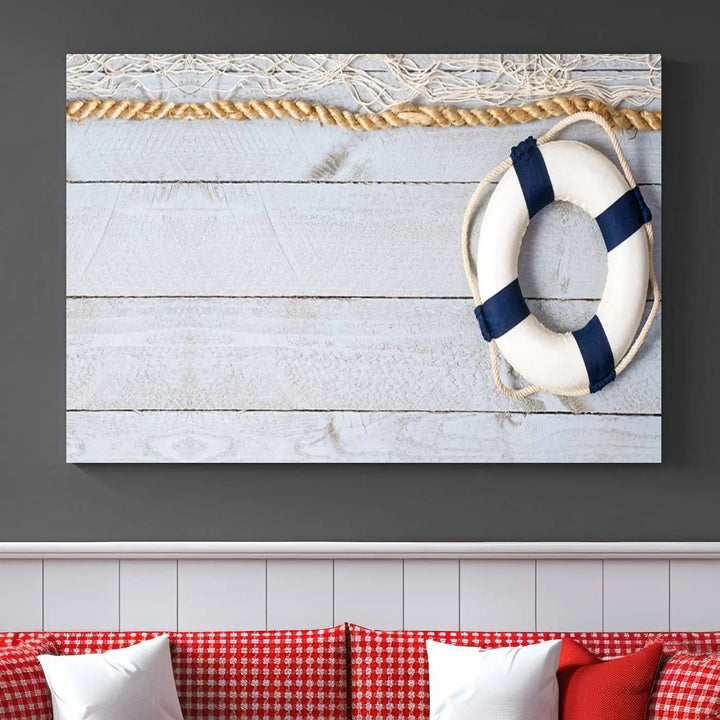 A triptych of the Fancy Lifebuoy and rope on museum-quality canvas with UV-protective coating hangs above.