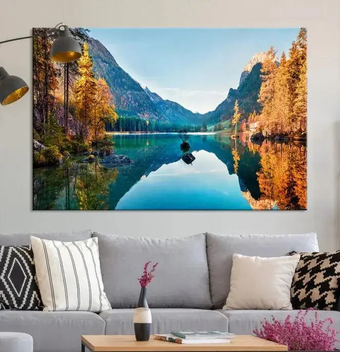 The focal point of the room is the "Fantastic Autumn Panorama Wall Art Canvas Print," a triptych depicting a serene lake and mountains, printed on museum-quality canvas and ready to hang.