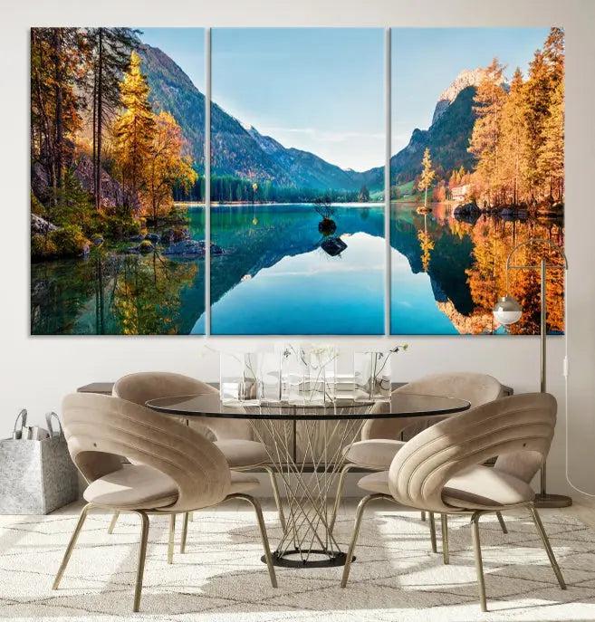 The focal point of the room is the "Fantastic Autumn Panorama Wall Art Canvas Print," a triptych depicting a serene lake and mountains, printed on museum-quality canvas and ready to hang.