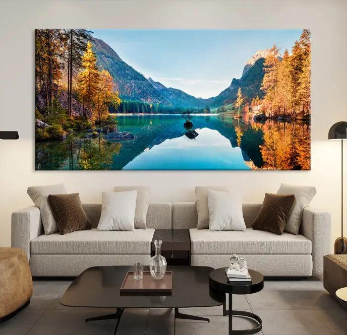 The focal point of the room is the "Fantastic Autumn Panorama Wall Art Canvas Print," a triptych depicting a serene lake and mountains, printed on museum-quality canvas and ready to hang.