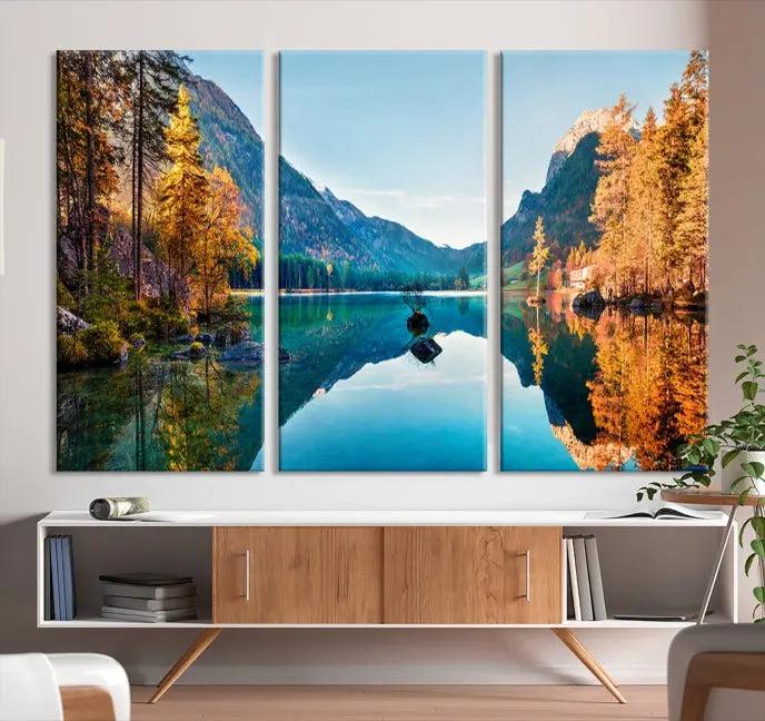 The focal point of the room is the "Fantastic Autumn Panorama Wall Art Canvas Print," a triptych depicting a serene lake and mountains, printed on museum-quality canvas and ready to hang.