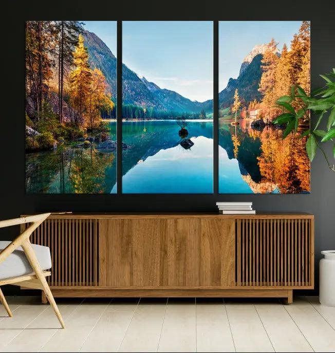 The focal point of the room is the "Fantastic Autumn Panorama Wall Art Canvas Print," a triptych depicting a serene lake and mountains, printed on museum-quality canvas and ready to hang.