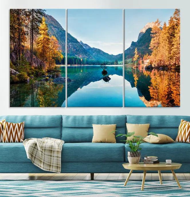 The focal point of the room is the "Fantastic Autumn Panorama Wall Art Canvas Print," a triptych depicting a serene lake and mountains, printed on museum-quality canvas and ready to hang.