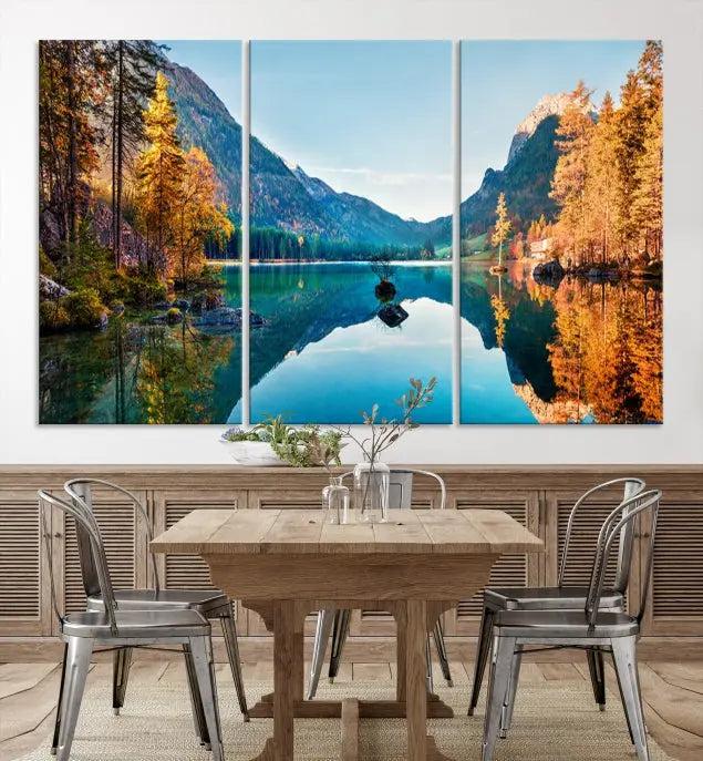 The focal point of the room is the "Fantastic Autumn Panorama Wall Art Canvas Print," a triptych depicting a serene lake and mountains, printed on museum-quality canvas and ready to hang.