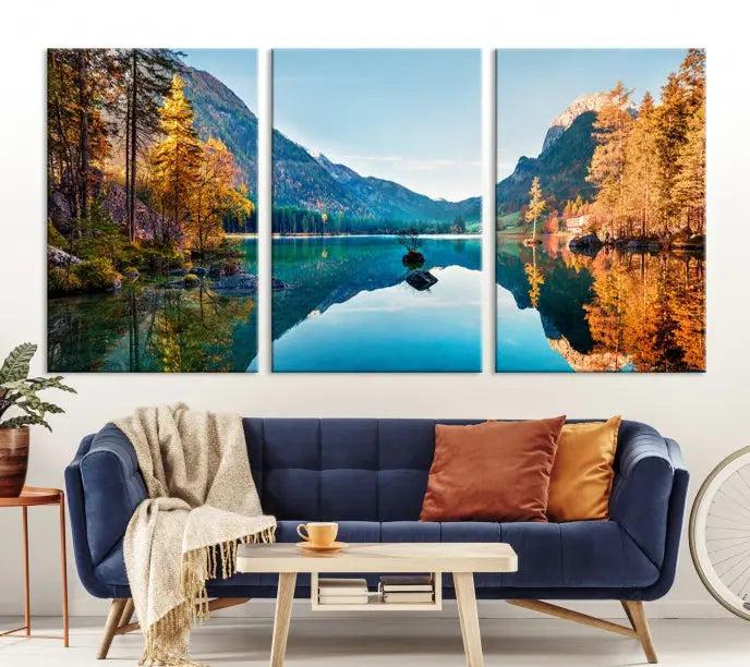 The focal point of the room is the "Fantastic Autumn Panorama Wall Art Canvas Print," a triptych depicting a serene lake and mountains, printed on museum-quality canvas and ready to hang.