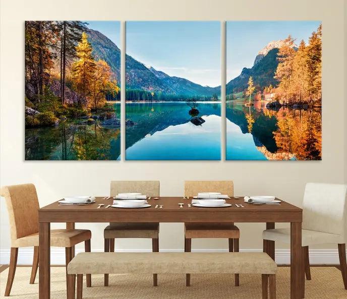 The focal point of the room is the "Fantastic Autumn Panorama Wall Art Canvas Print," a triptych depicting a serene lake and mountains, printed on museum-quality canvas and ready to hang.