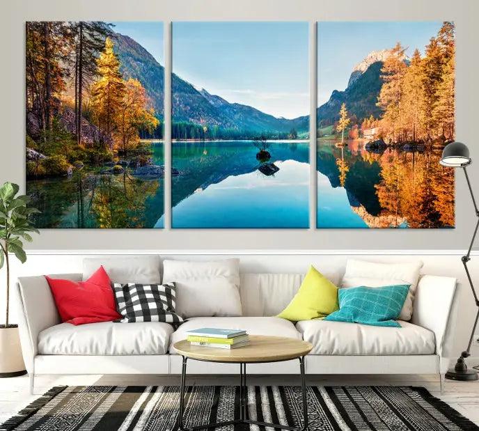 The focal point of the room is the "Fantastic Autumn Panorama Wall Art Canvas Print," a triptych depicting a serene lake and mountains, printed on museum-quality canvas and ready to hang.