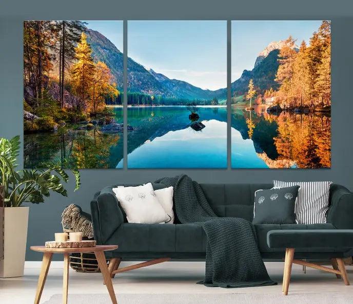 The focal point of the room is the "Fantastic Autumn Panorama Wall Art Canvas Print," a triptych depicting a serene lake and mountains, printed on museum-quality canvas and ready to hang.