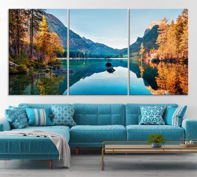 The focal point of the room is the "Fantastic Autumn Panorama Wall Art Canvas Print," a triptych depicting a serene lake and mountains, printed on museum-quality canvas and ready to hang.