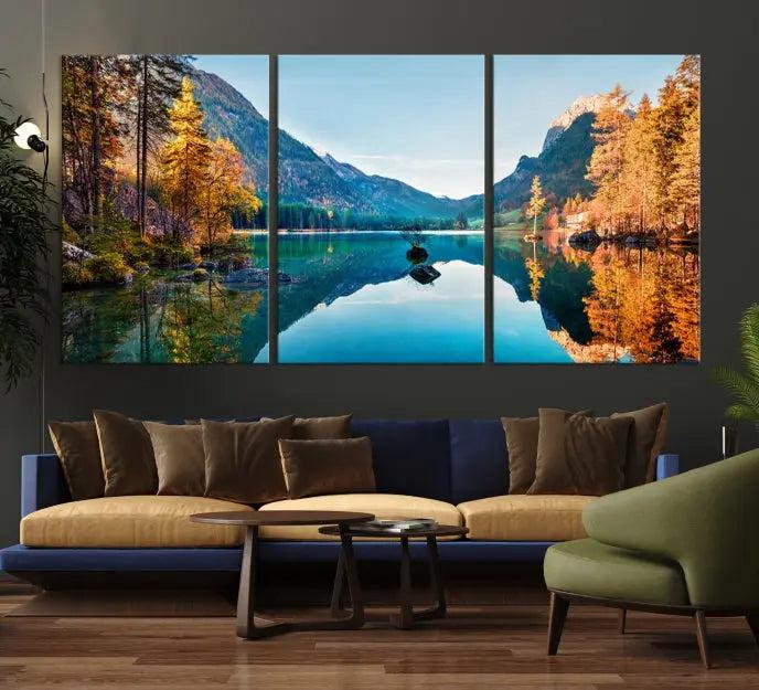 The focal point of the room is the "Fantastic Autumn Panorama Wall Art Canvas Print," a triptych depicting a serene lake and mountains, printed on museum-quality canvas and ready to hang.