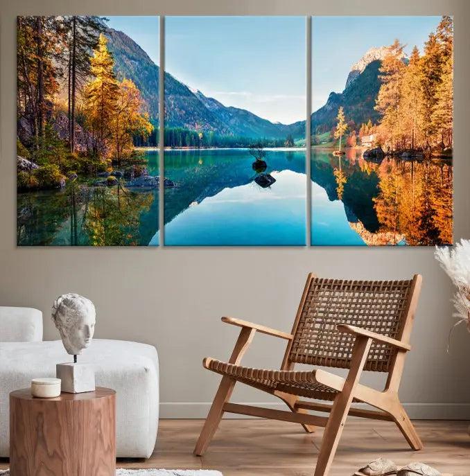 The focal point of the room is the "Fantastic Autumn Panorama Wall Art Canvas Print," a triptych depicting a serene lake and mountains, printed on museum-quality canvas and ready to hang.