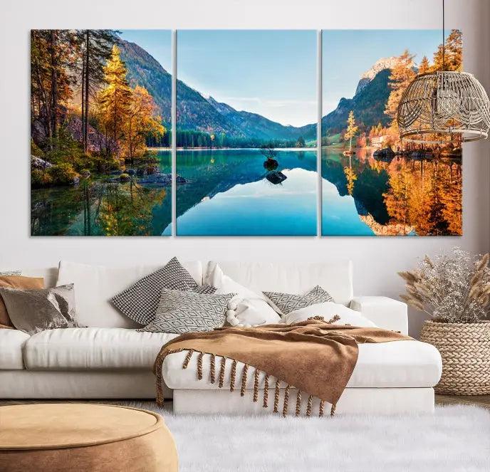 The focal point of the room is the "Fantastic Autumn Panorama Wall Art Canvas Print," a triptych depicting a serene lake and mountains, printed on museum-quality canvas and ready to hang.