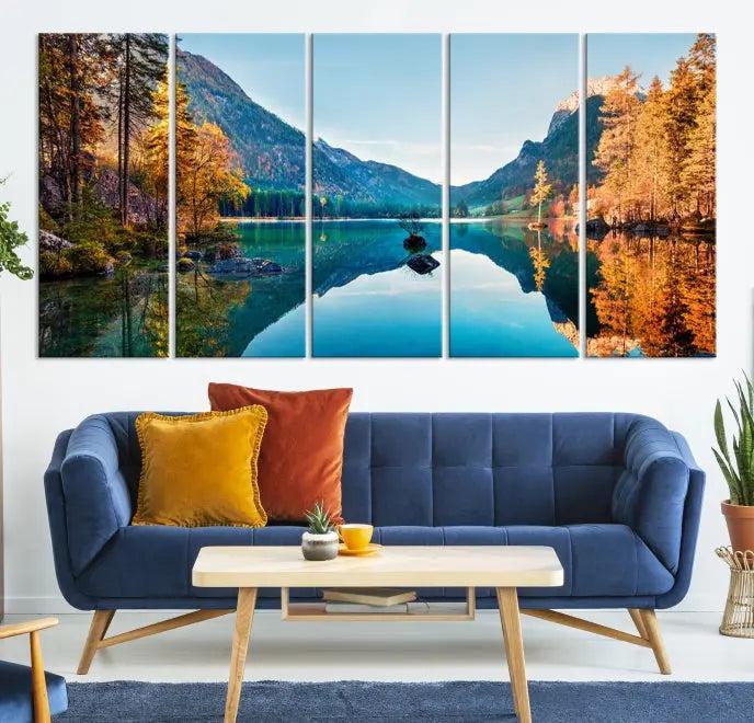 The focal point of the room is the "Fantastic Autumn Panorama Wall Art Canvas Print," a triptych depicting a serene lake and mountains, printed on museum-quality canvas and ready to hang.