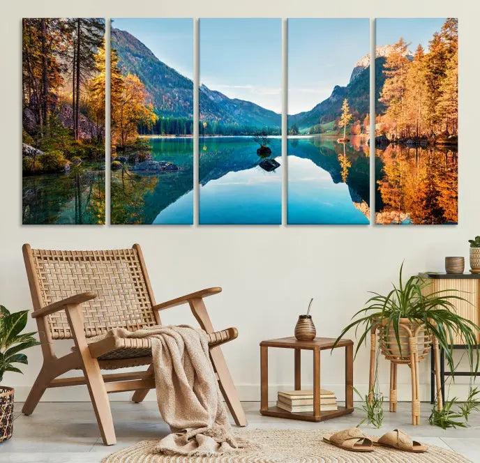 The focal point of the room is the "Fantastic Autumn Panorama Wall Art Canvas Print," a triptych depicting a serene lake and mountains, printed on museum-quality canvas and ready to hang.