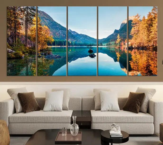 The focal point of the room is the "Fantastic Autumn Panorama Wall Art Canvas Print," a triptych depicting a serene lake and mountains, printed on museum-quality canvas and ready to hang.