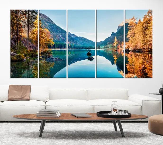 The focal point of the room is the "Fantastic Autumn Panorama Wall Art Canvas Print," a triptych depicting a serene lake and mountains, printed on museum-quality canvas and ready to hang.