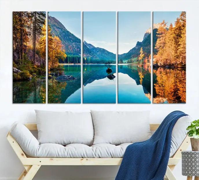 The focal point of the room is the "Fantastic Autumn Panorama Wall Art Canvas Print," a triptych depicting a serene lake and mountains, printed on museum-quality canvas and ready to hang.