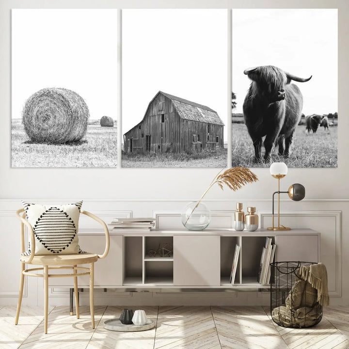 The Farmhouse Wall Art Decor Canvas Print, a triptych artwork, showcases a hay bale, wooden barn, and Highland cow in a meadow. Crafted on museum-quality canvas with neutral tones to create a cozy ambiance, this piece is handcrafted in the USA to enhance any space.