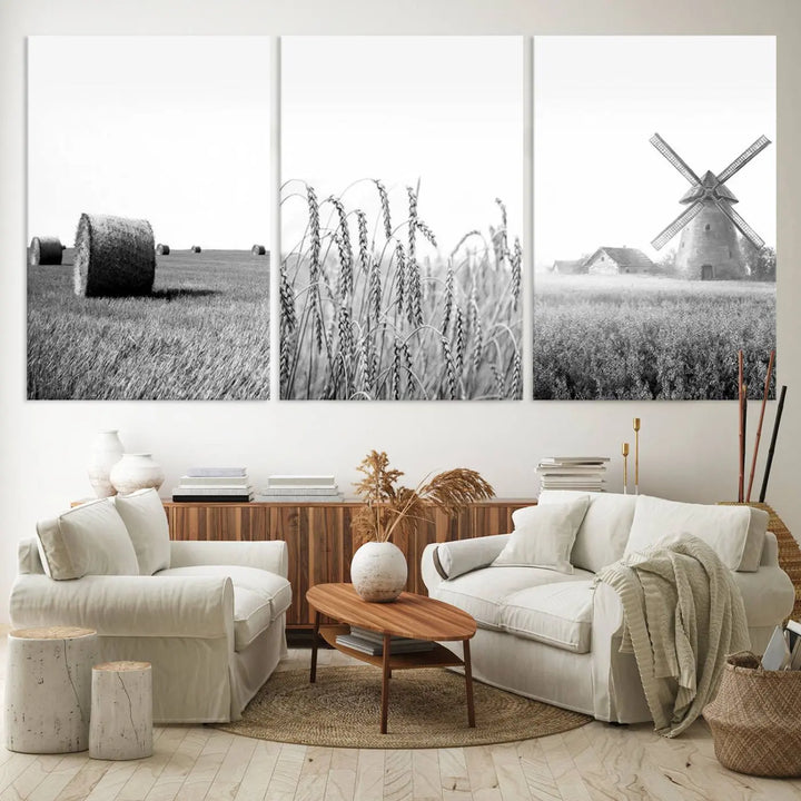 The "Farmhouse Windmill and Wheat Field Black and White 3-Panel Wall Art" brings rustic charm with its depiction of hay bales, wheat, and a windmill. This ready-to-hang canvas print creates an inviting country-inspired atmosphere in any space.