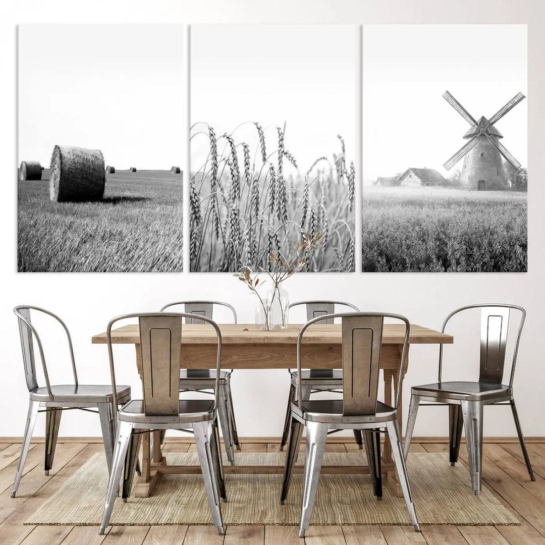 The "Farmhouse Windmill and Wheat Field Black and White 3-Panel Wall Art" brings rustic charm with its depiction of hay bales, wheat, and a windmill. This ready-to-hang canvas print creates an inviting country-inspired atmosphere in any space.