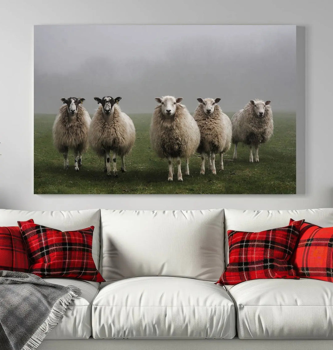 The "Flock of Sheep in a Mystical Fog" pastoral wall art canvas print, framed and ready to hang, adds a touch of farmhouse decor to the room.