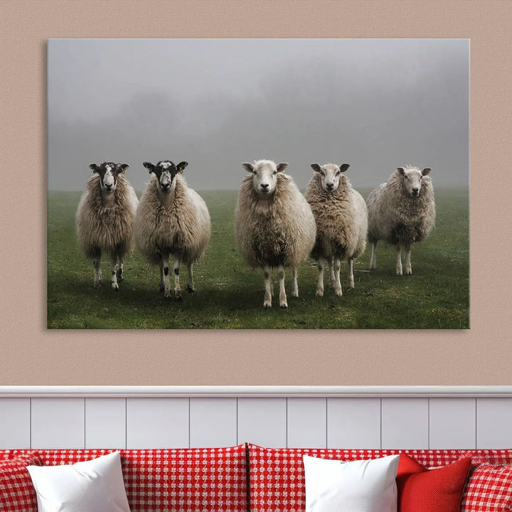 The "Flock of Sheep in a Mystical Fog" pastoral wall art canvas print, framed and ready to hang, adds a touch of farmhouse decor to the room.