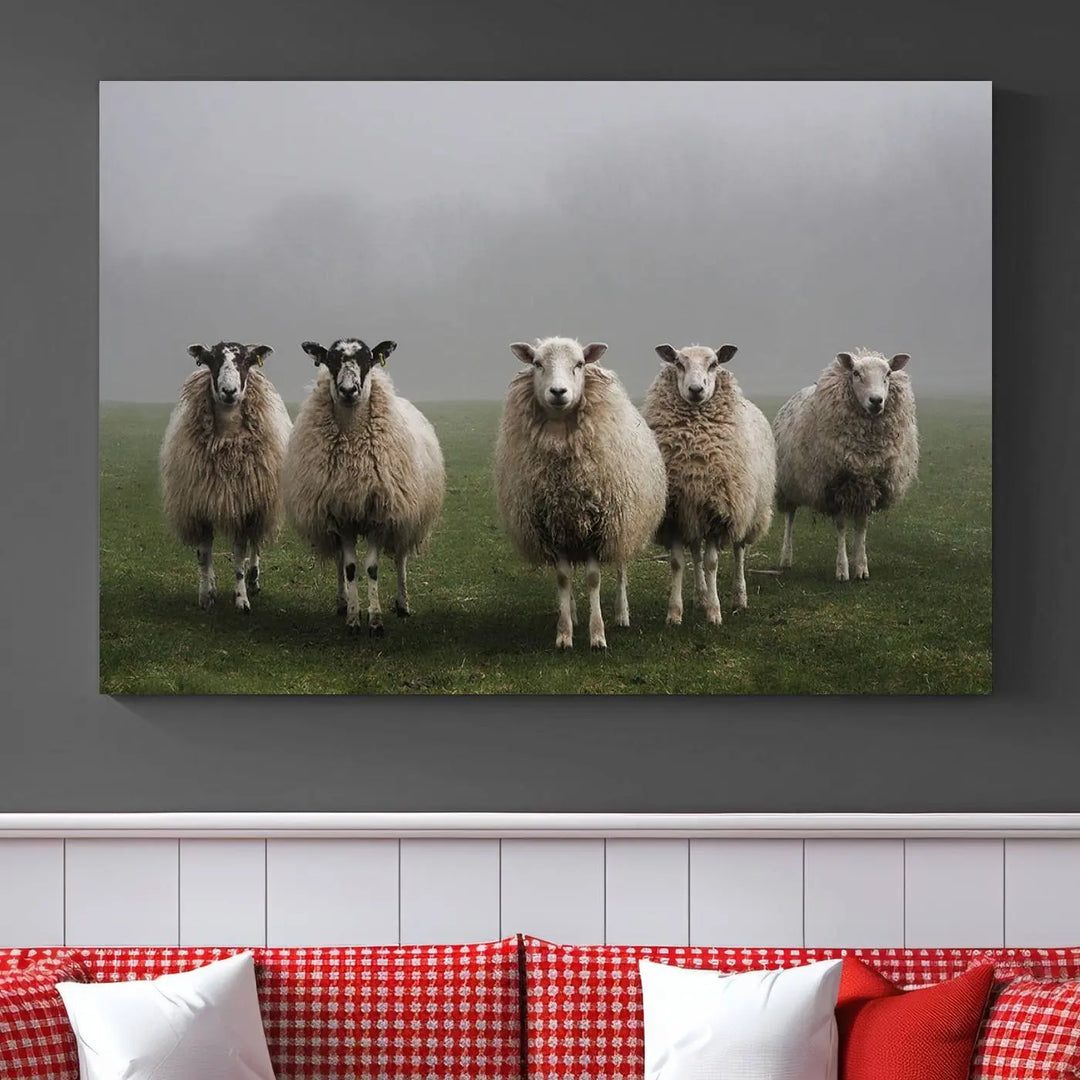 The "Flock of Sheep in a Mystical Fog" pastoral wall art canvas print, framed and ready to hang, adds a touch of farmhouse decor to the room.