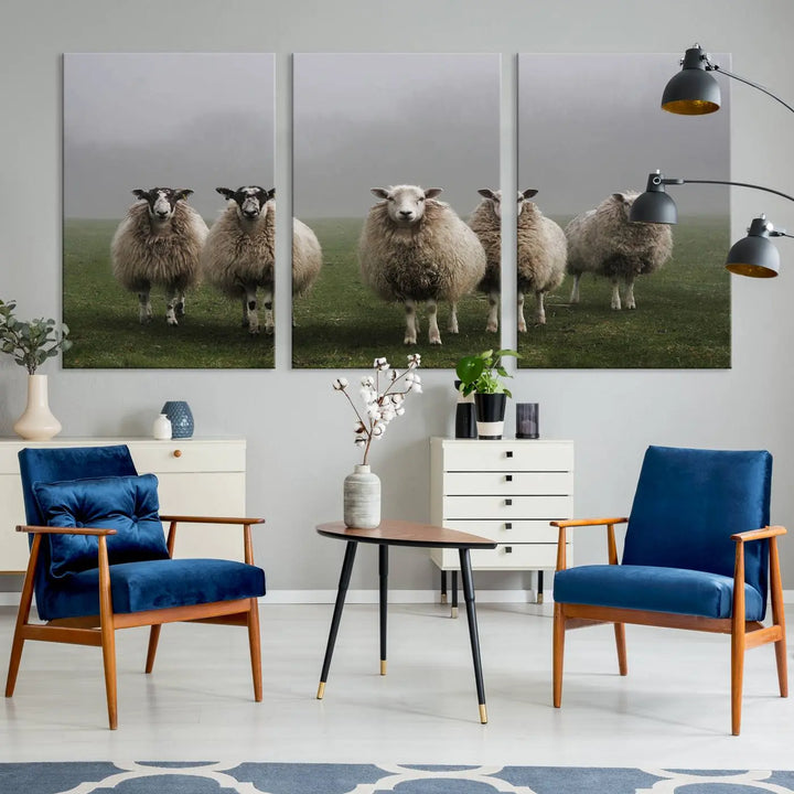 The "Flock of Sheep in a Mystical Fog" pastoral wall art canvas print, framed and ready to hang, adds a touch of farmhouse decor to the room.