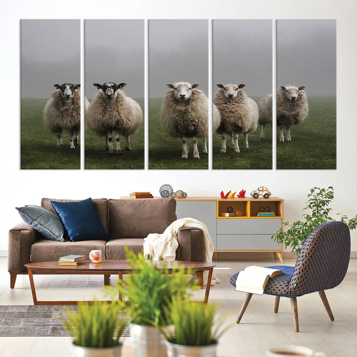 The "Flock of Sheep in a Mystical Fog" pastoral wall art canvas print, framed and ready to hang, adds a touch of farmhouse decor to the room.