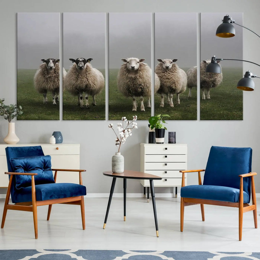 The "Flock of Sheep in a Mystical Fog" pastoral wall art canvas print, framed and ready to hang, adds a touch of farmhouse decor to the room.