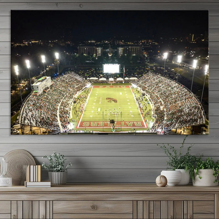 A museum-quality canvas depicting an aerial view of Tallahassee's Bragg Memorial Stadium, home of the Florida A&M Rattlers, brightly lit at night.