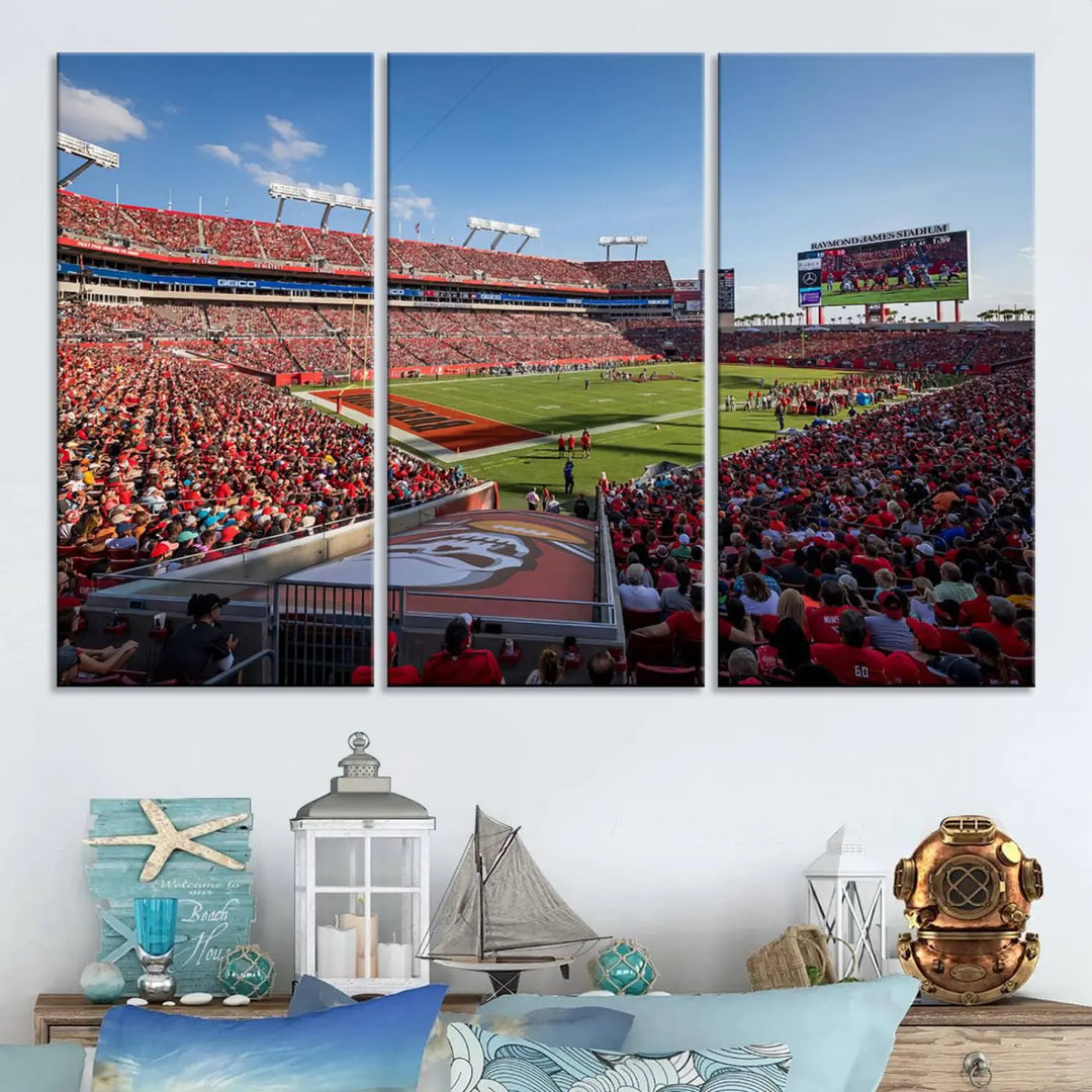 A panoramic view of the bustling Raymond James Stadium, filled with fans in red, is vividly captured in high-resolution on museum-quality canvas. This three-panel wall art of the Florida Tampa NFL stadium complements coastal decor beautifully.