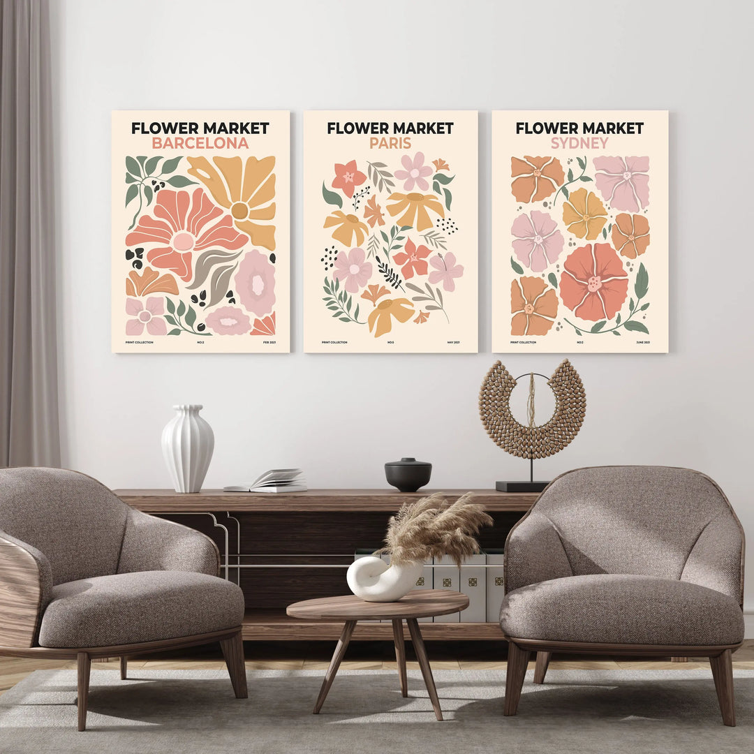 Enhance your living room with the Flower Market Wall Art Set—a 3-panel collection featuring botanical boho flower art from Barcelona, Paris, and Sydney.