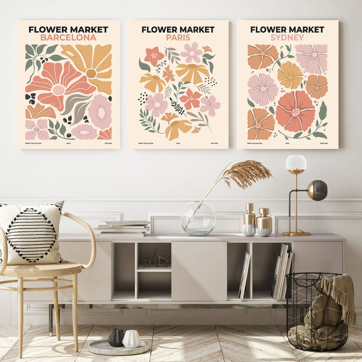 Enhance your living room with the Flower Market Wall Art Set—a 3-panel collection featuring botanical boho flower art from Barcelona, Paris, and Sydney.