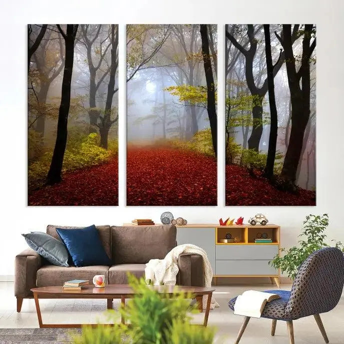 The Foggy Forest Wall Art Landscape Canvas Print beautifully enhances the space. This triptych artwork showcases a misty autumn forest with a red-leafed path, presented on museum-quality canvases with UV-protective coating for enduring allure. Enjoy the added benefit of free shipping on your purchase.