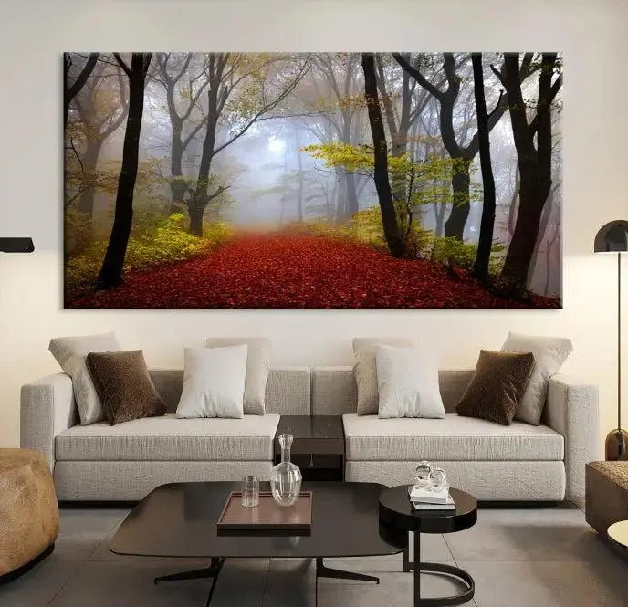 The Foggy Forest Wall Art Landscape Canvas Print beautifully enhances the space. This triptych artwork showcases a misty autumn forest with a red-leafed path, presented on museum-quality canvases with UV-protective coating for enduring allure. Enjoy the added benefit of free shipping on your purchase.