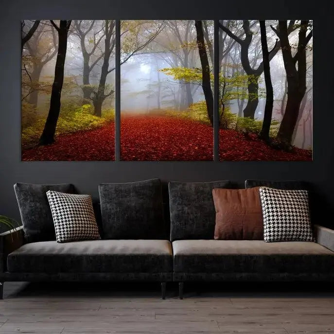 The Foggy Forest Wall Art Landscape Canvas Print beautifully enhances the space. This triptych artwork showcases a misty autumn forest with a red-leafed path, presented on museum-quality canvases with UV-protective coating for enduring allure. Enjoy the added benefit of free shipping on your purchase.