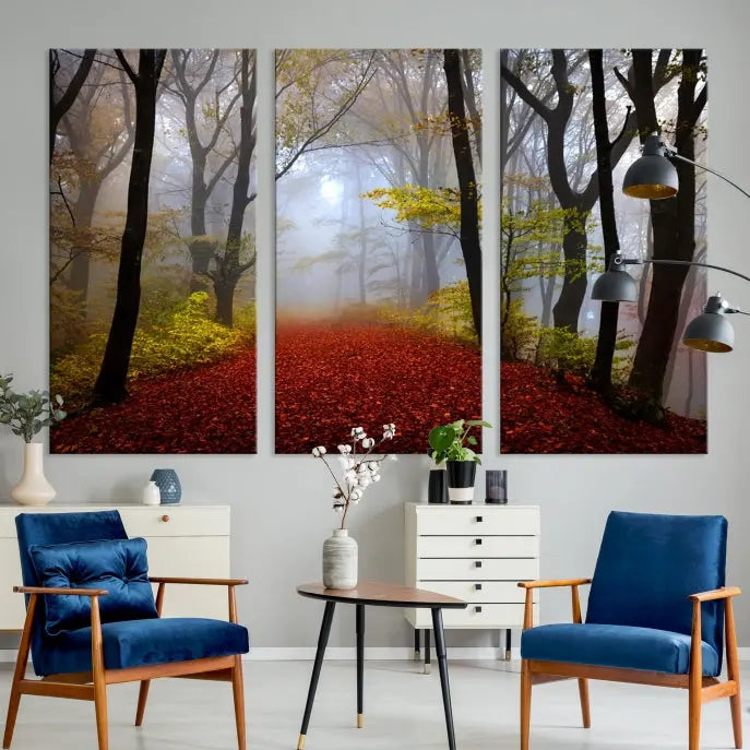 The Foggy Forest Wall Art Landscape Canvas Print beautifully enhances the space. This triptych artwork showcases a misty autumn forest with a red-leafed path, presented on museum-quality canvases with UV-protective coating for enduring allure. Enjoy the added benefit of free shipping on your purchase.